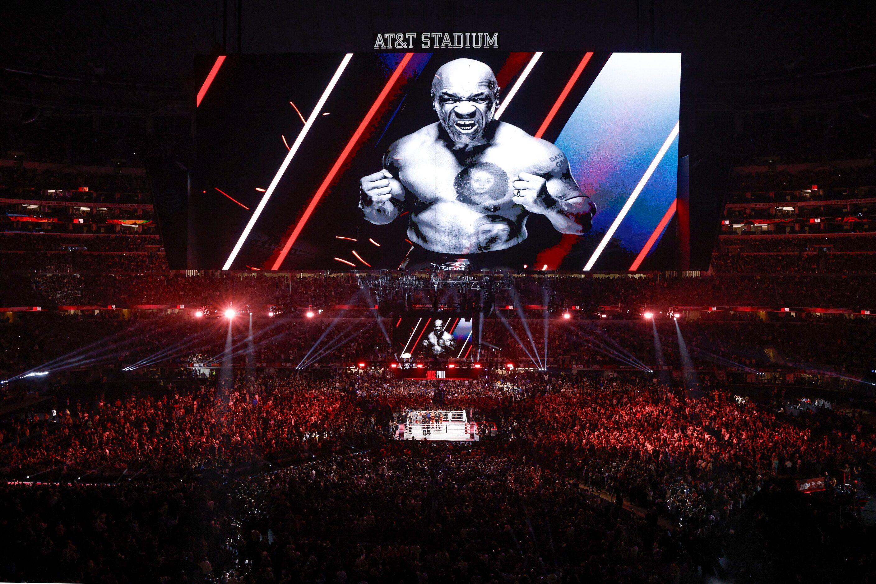 Mike Tyson is shown on the video board his heavyweight boxing match against Jake Paul at...