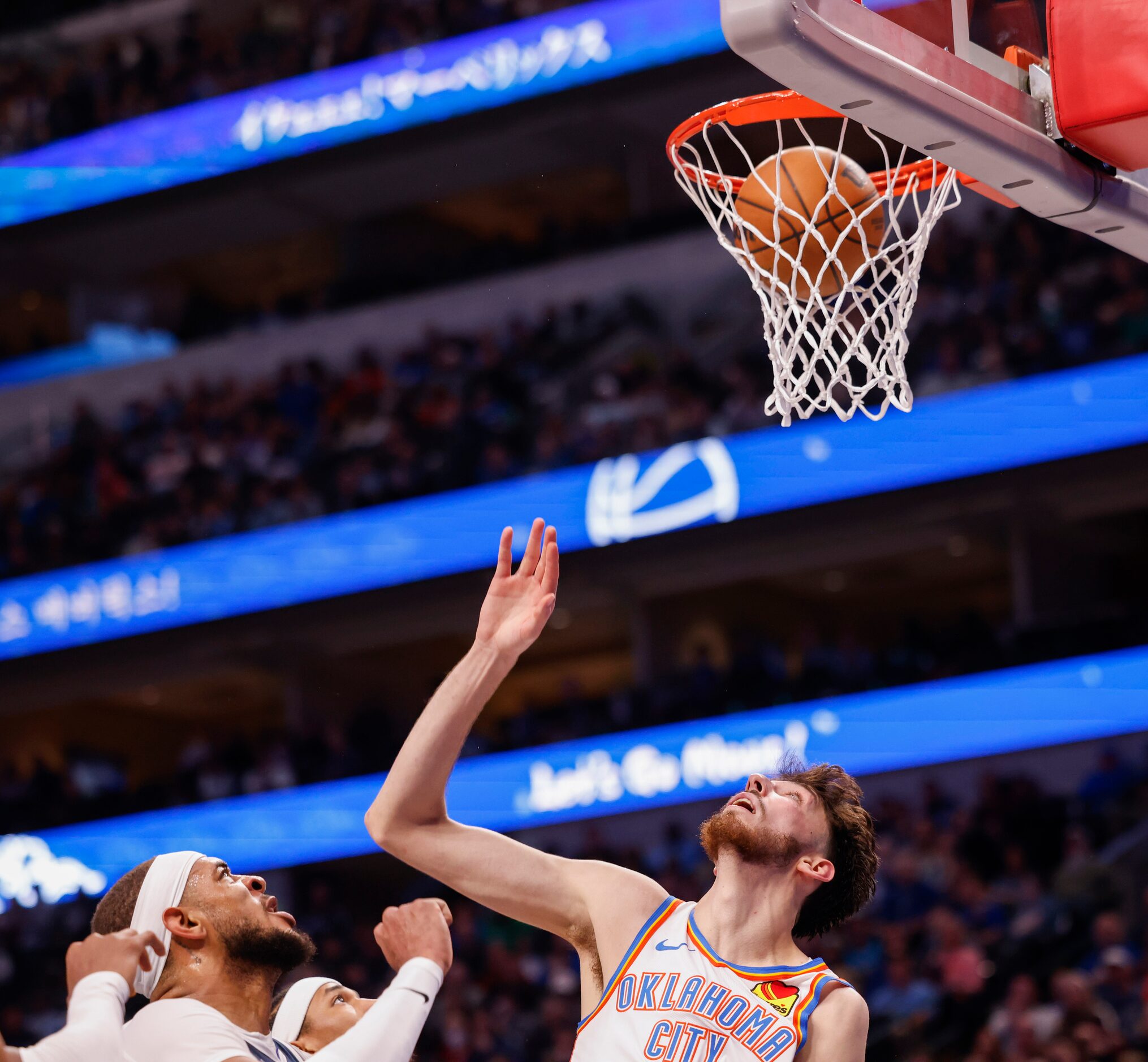 Dallas Mavericks center Daniel Gafford (21) watches as his shot goes in over Oklahoma City...