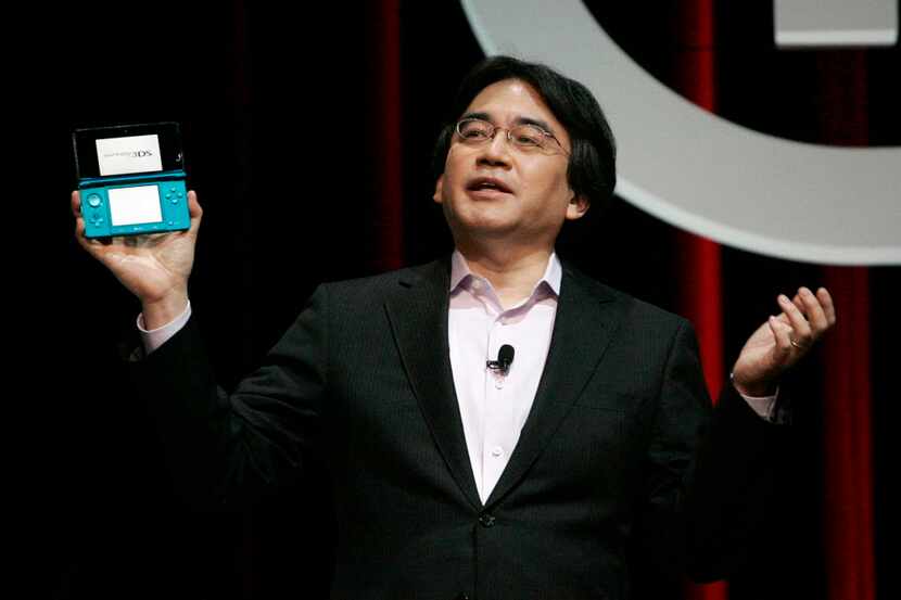 Satoru Iwata, president of Nintendo Co., introduces the new 3DS game at the Electronic...