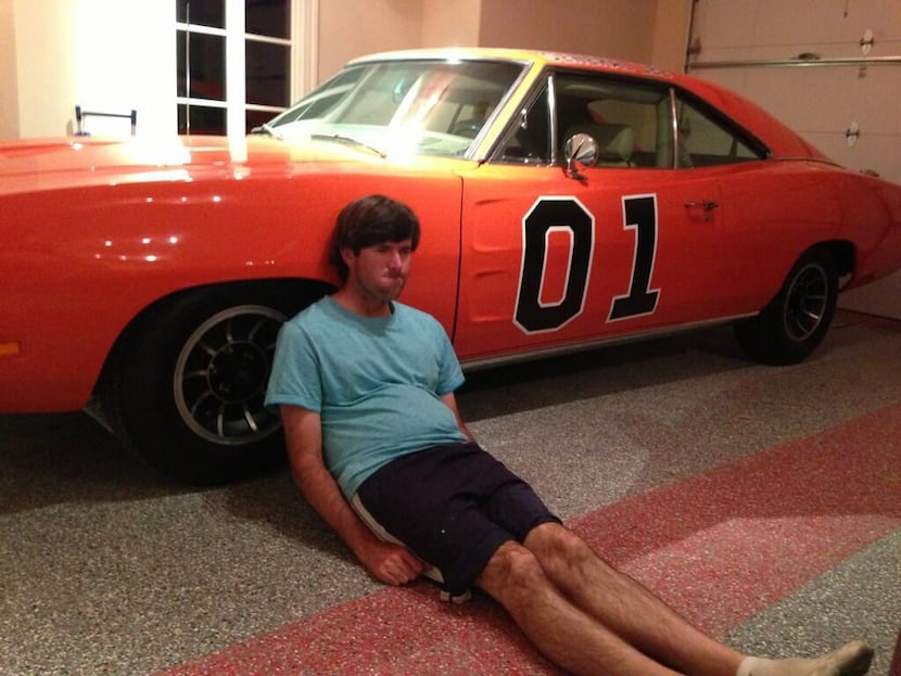 Bubba Watson shows his version of "dufnering"  with his car, the General Lee.
