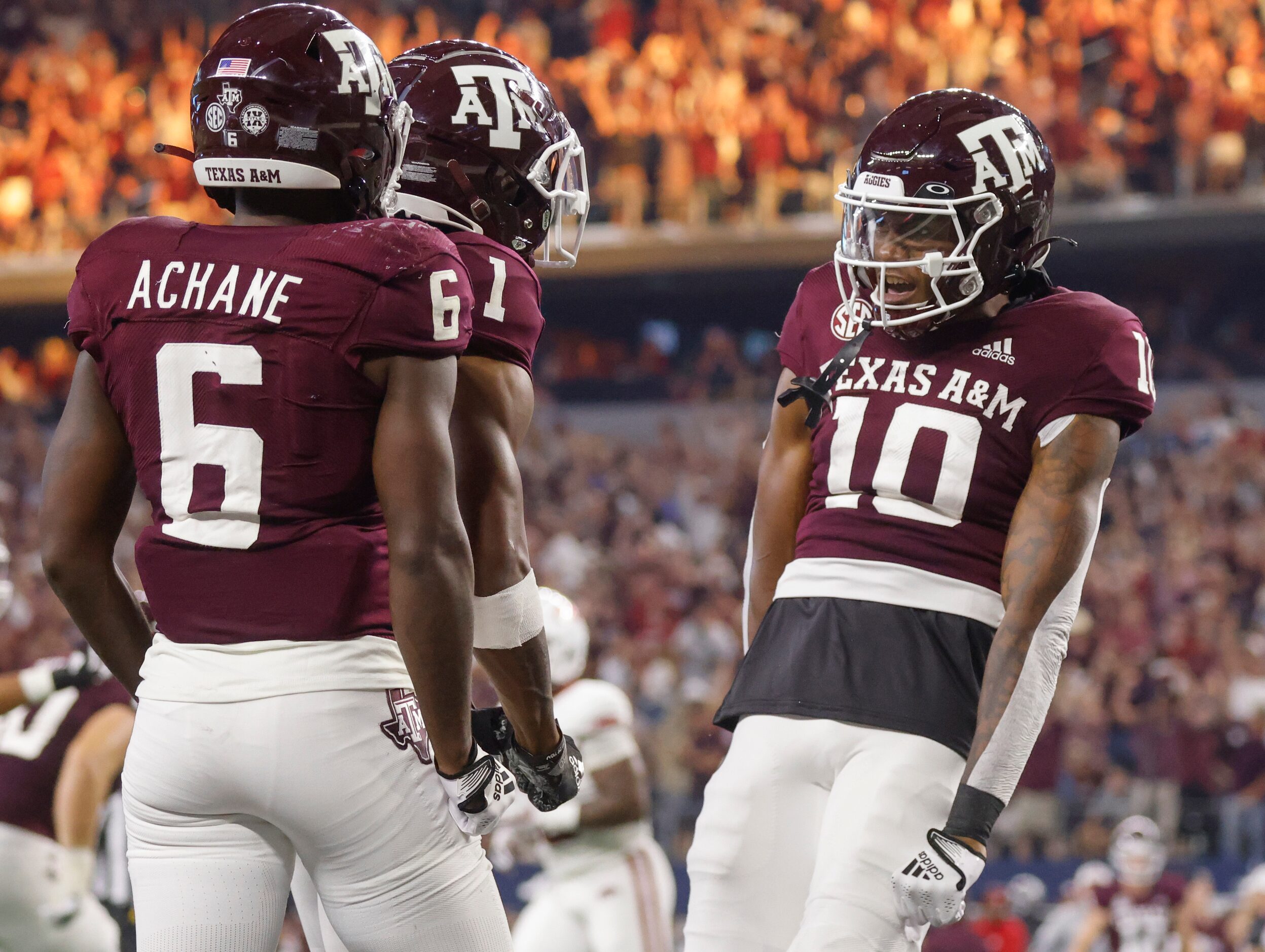 Texas A&M wide receiver Evan Stewart (1) celebrates a touchdown with wide receiver Chris...