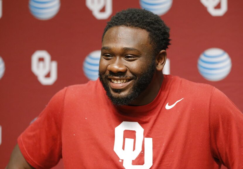 In this Saturday, Aug. 2, 2014 photo, Oklahoma defensive end Charles Tapper answers a...