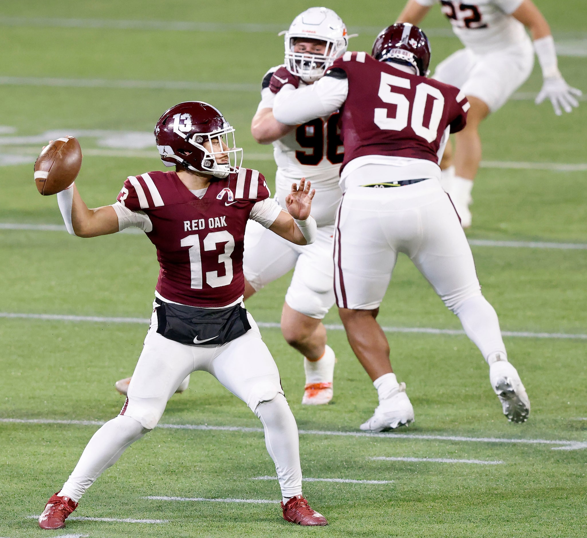 Red Oak quarterback Chris Martinez (13) throws a first quarter pass against Aledo in their...