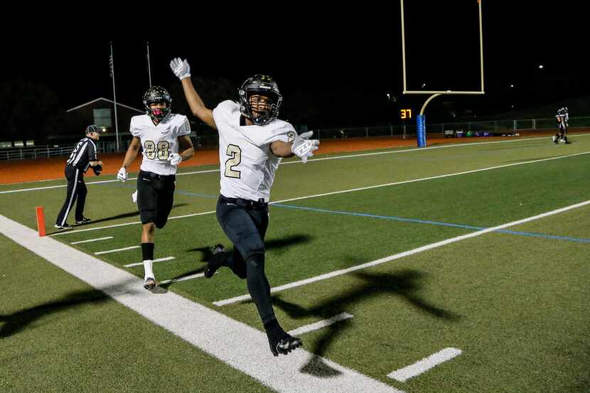 The Colony running back Myles Price (2) celebrates scoring a touchdown against Frisco...