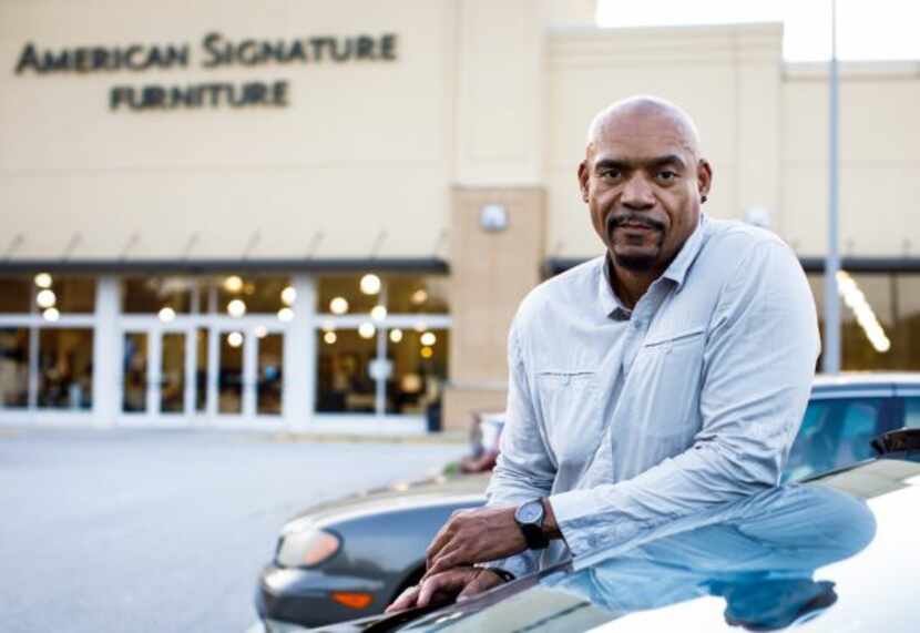 Leroy Walton bought goods at American Signature Furniture through a contract with Acceptance...
