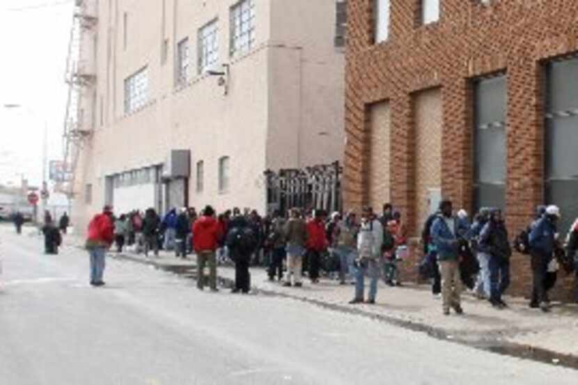 A long line gathers outside the Stewpot, one of the Dallas Morning News Charities.