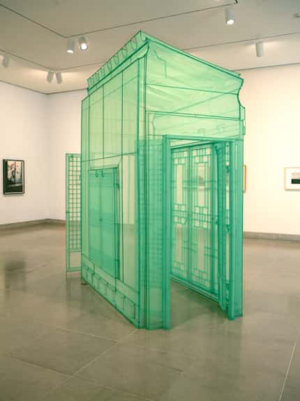 Do Ho Suh’s 2016 replica of an entrance to his childhood home in Korea is made entirely of...