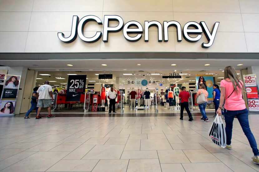 In this Wednesday, June 7, 2017, photo, shoppers walk into a J.C. Penney department store in...