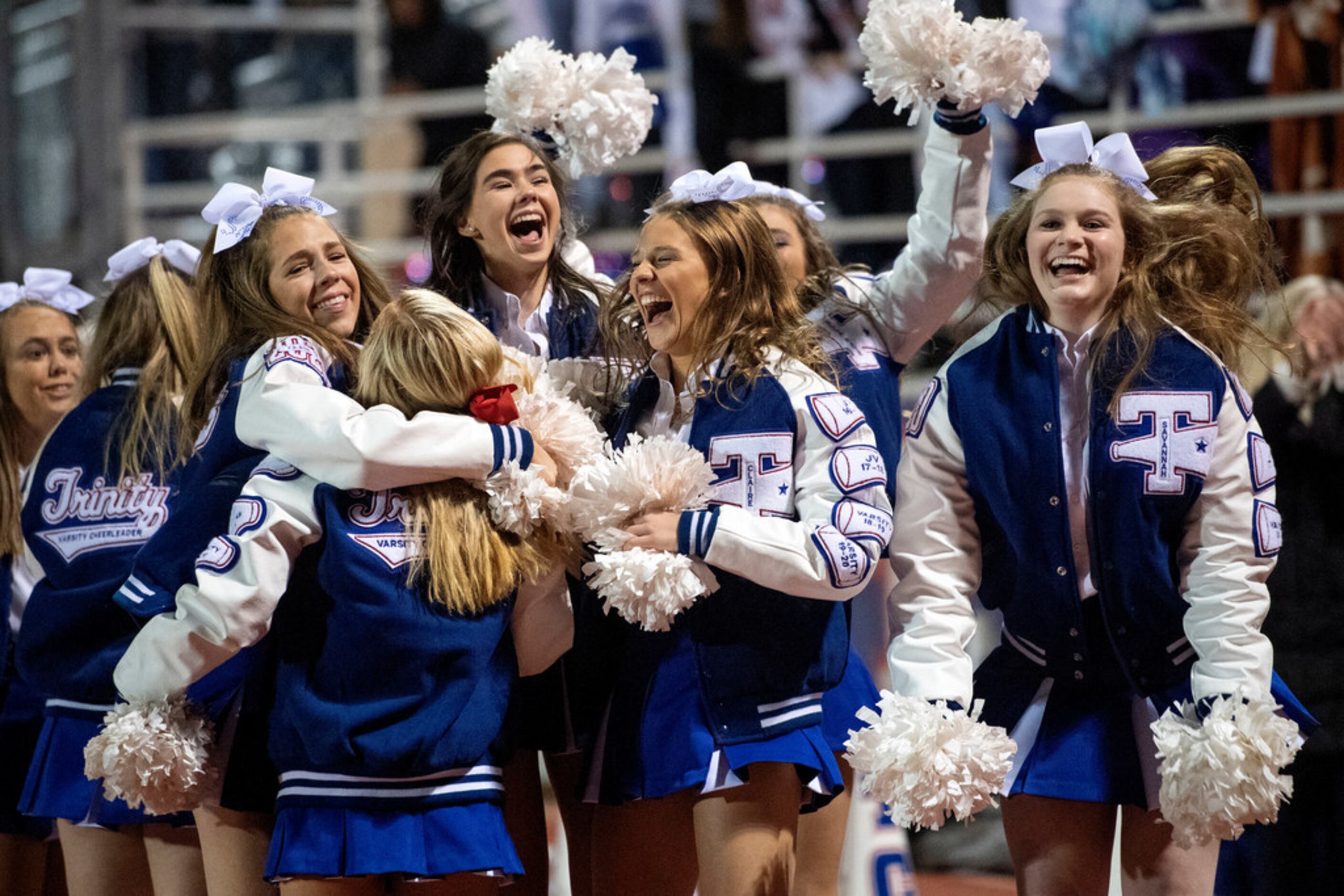 TCA-Addison cheerleaders celebrate a big play in the first half of a high school football...