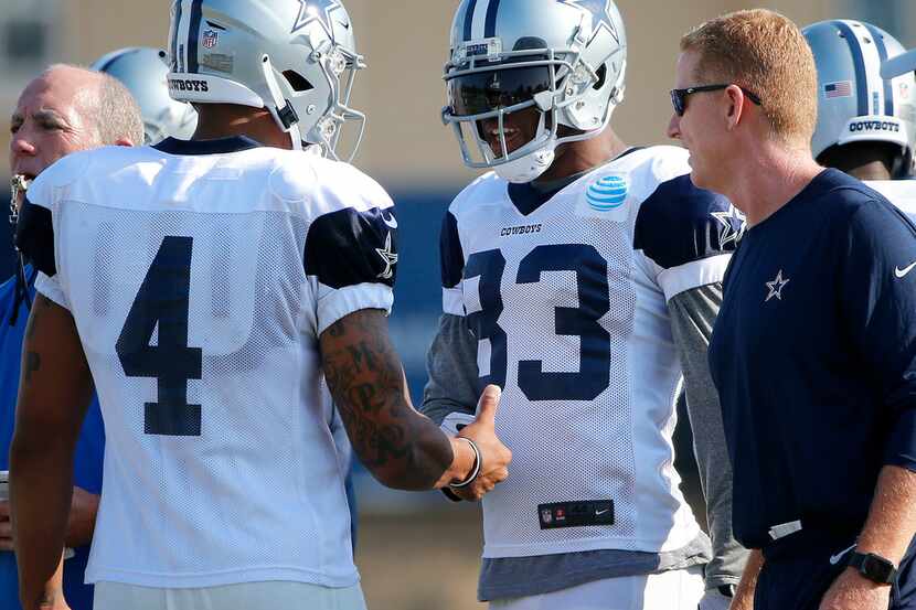 FILE - Dallas Cowboys wide receiver Terrance Williams (83) is congratulated by quarterback...