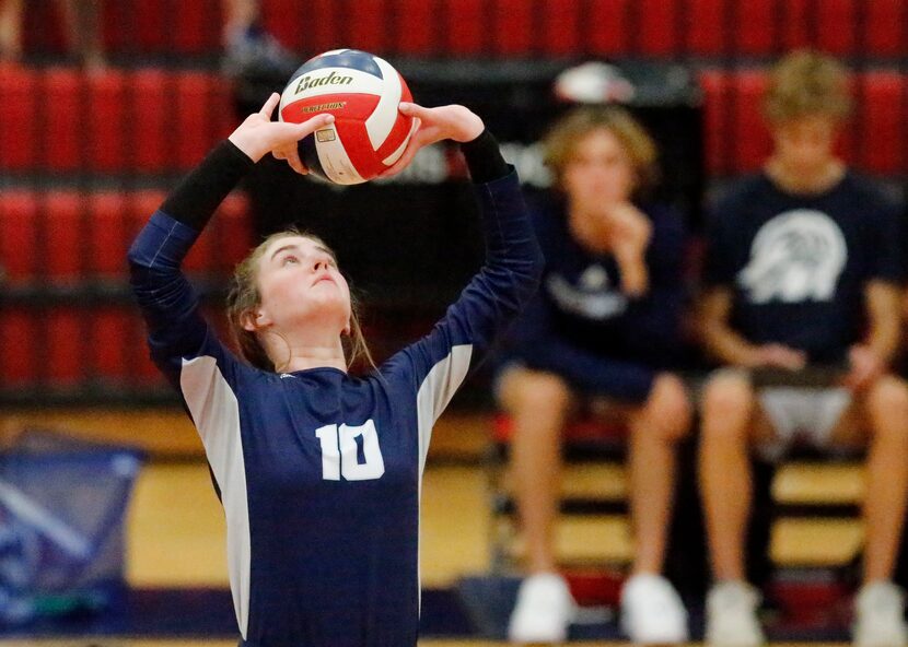 Flower Mound High School setter Megan Farris (10) makes a set during game one as McKinney...