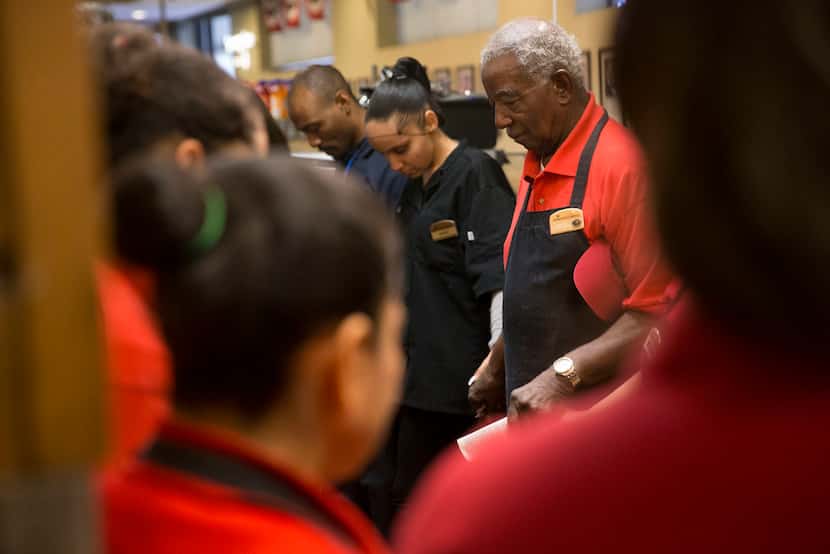 Ernest "Mr. B" Bowens leads the Highland Park Cafeteria in the daily morning prayer. He's...