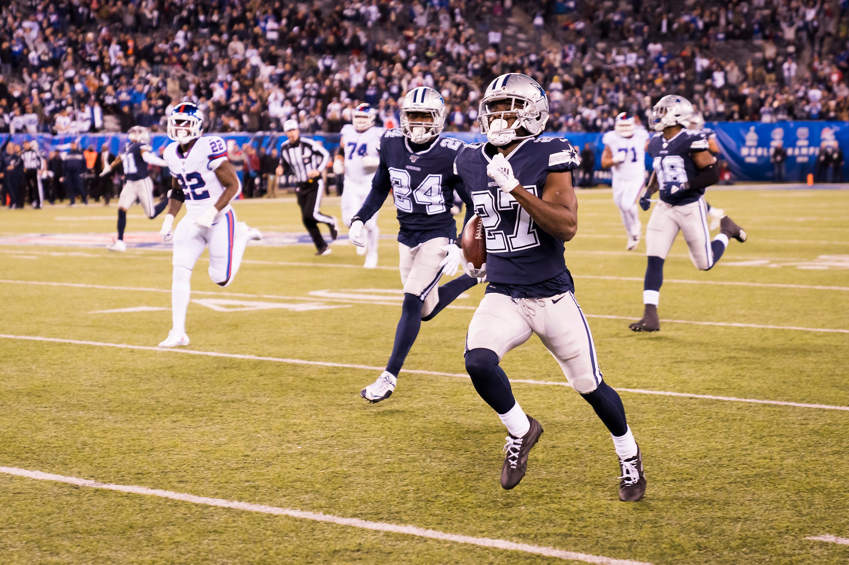 Dallas Cowboys cornerback Jourdan Lewis (27) returns a fumble by New York Giants quarterback...