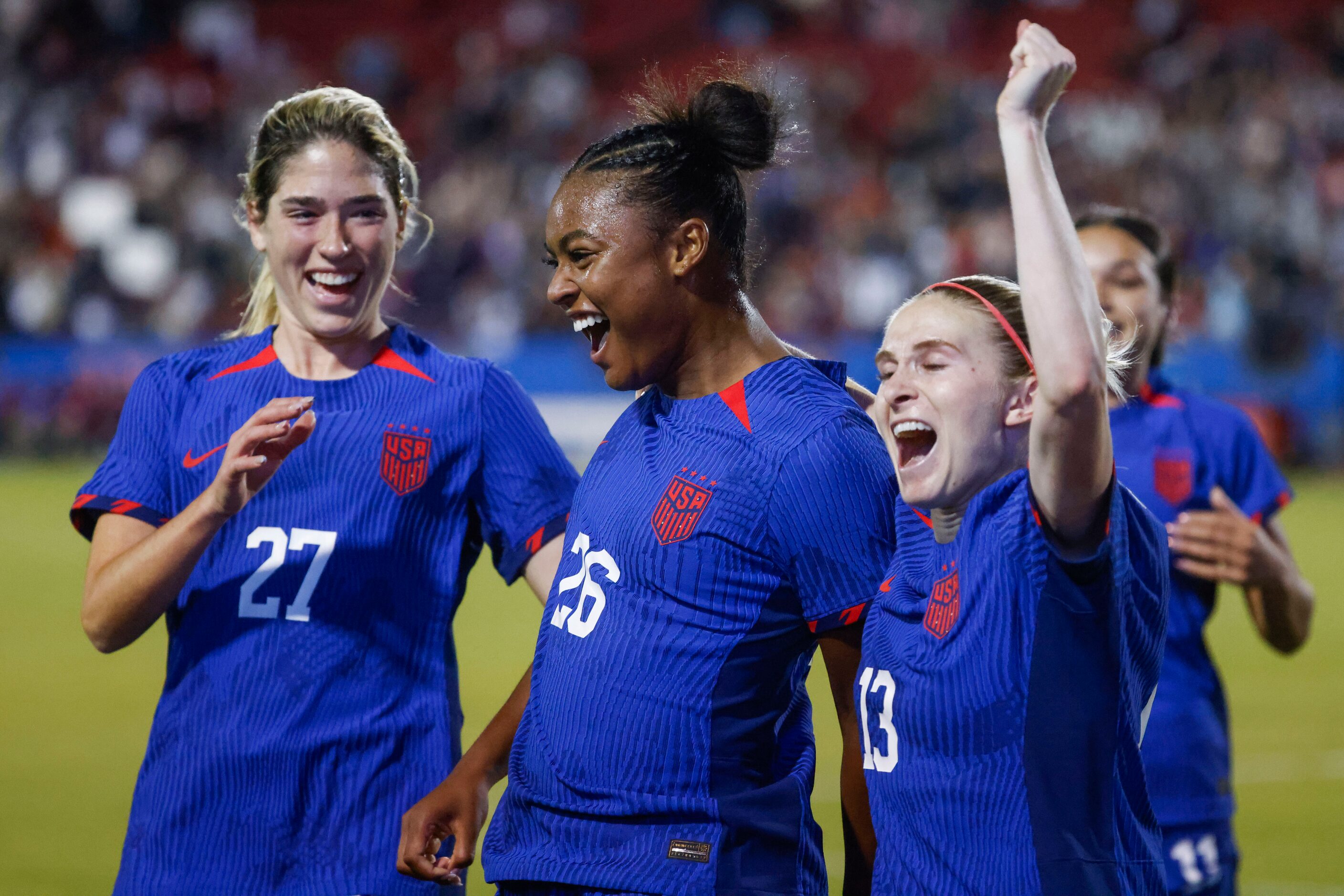 Untied State’s Jaedyn Shaw (center) celebrates her first international goal during the...