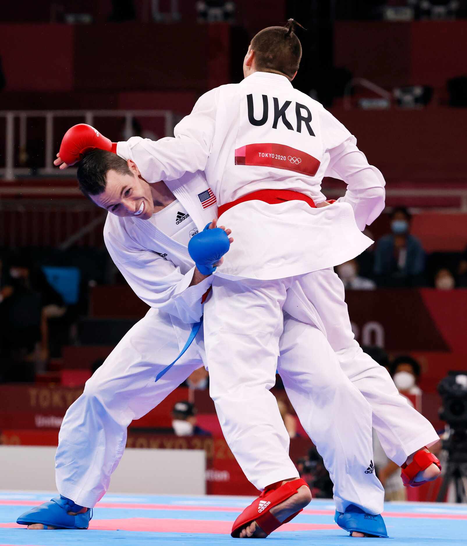 USA’s Tom Scott competes against Ukraine’s Stanislav Horuna during the karate men’s kumite...