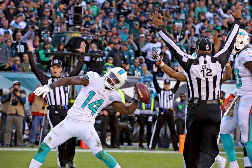 Miami Dolphins' Jarvis Landry scores a touchdown during the fourth quarter on Sunday, Nov....