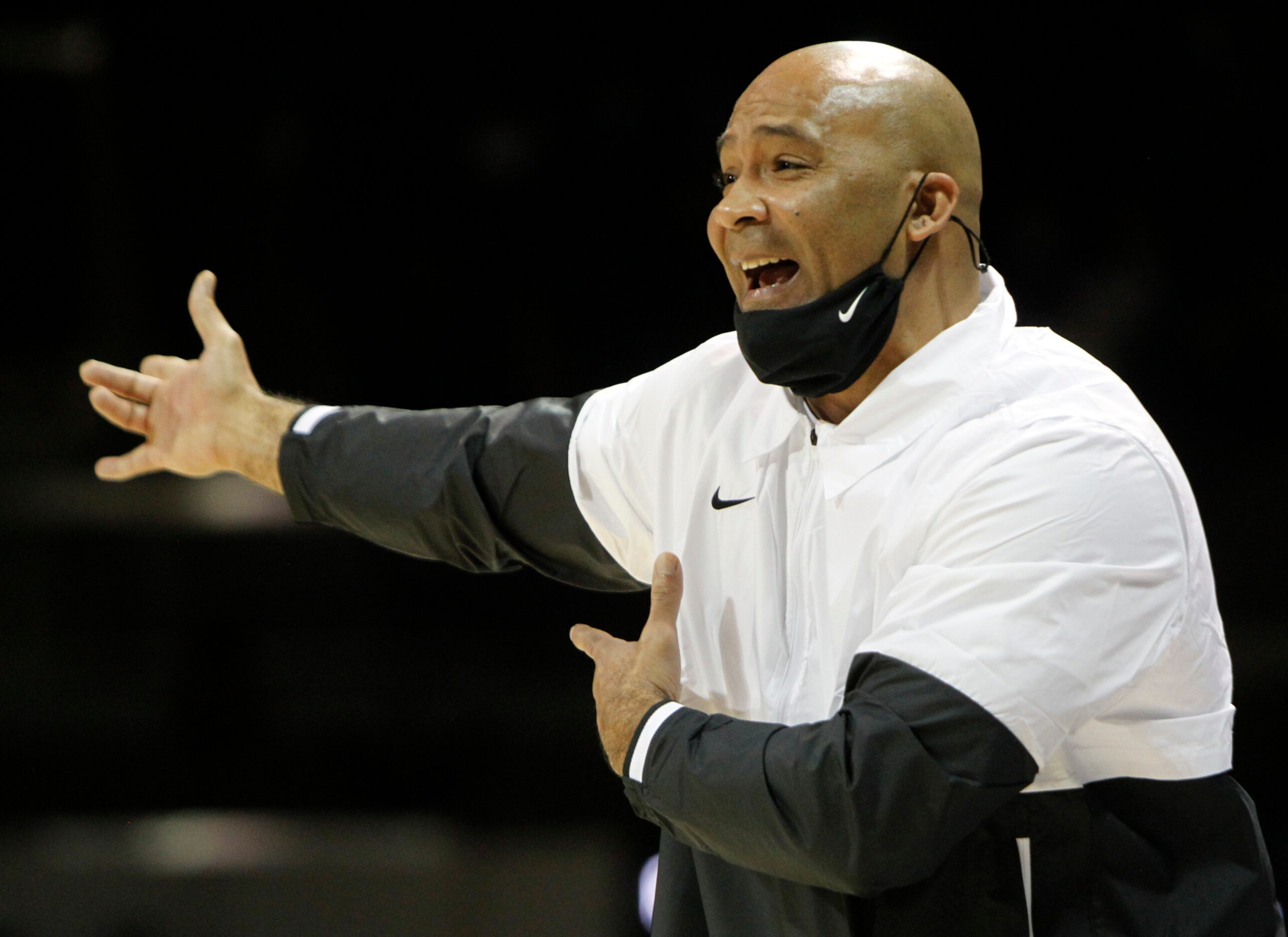 Duncanville head coach David Peavy responds to a decision made by a game official during...