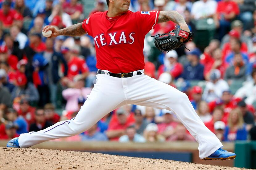 Texas Rangers relief pitcher Matt Bush throws a pitch against Toronto Blue Jays during the...