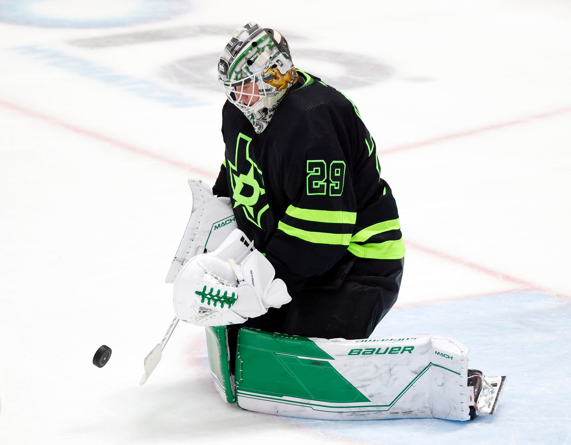 Dallas Stars goaltender Jake Oettinger (29) blocks  St. Louis Blues shot during the third...