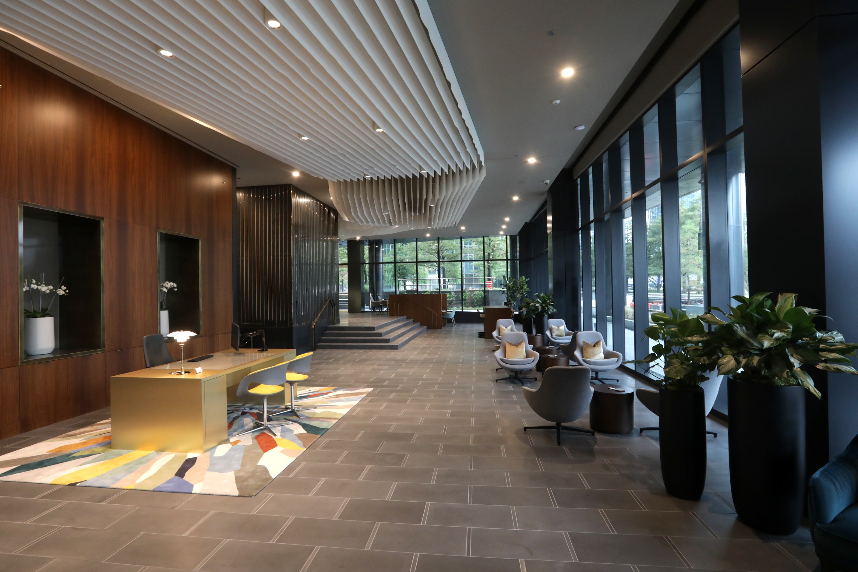 The lobby at Amli Fountain Place in stretches along Field Street near Woodall Rodgers Freeway.