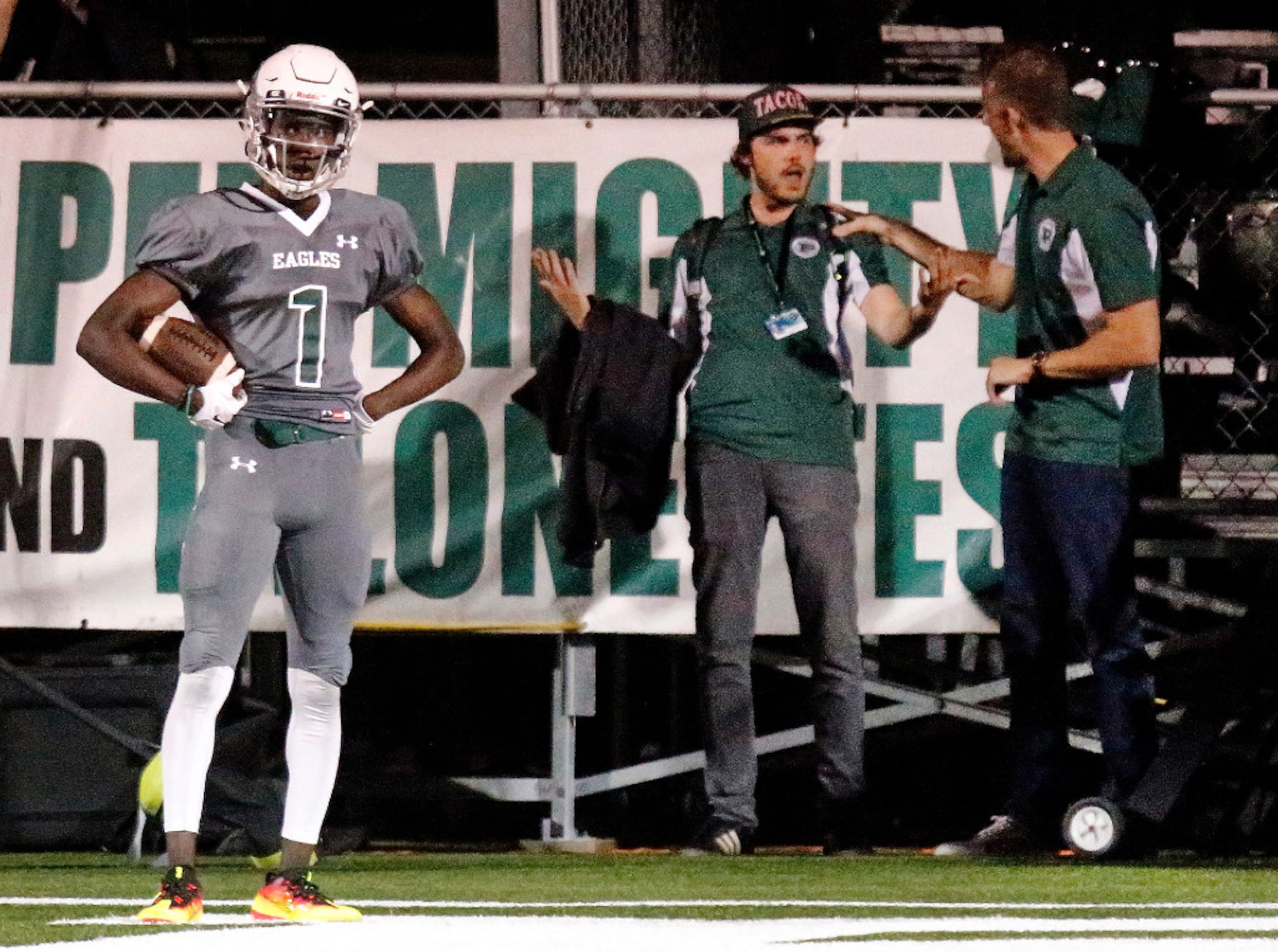 Prosper High School wide receiver Everett Jefferson (1) postures in the end zone after...