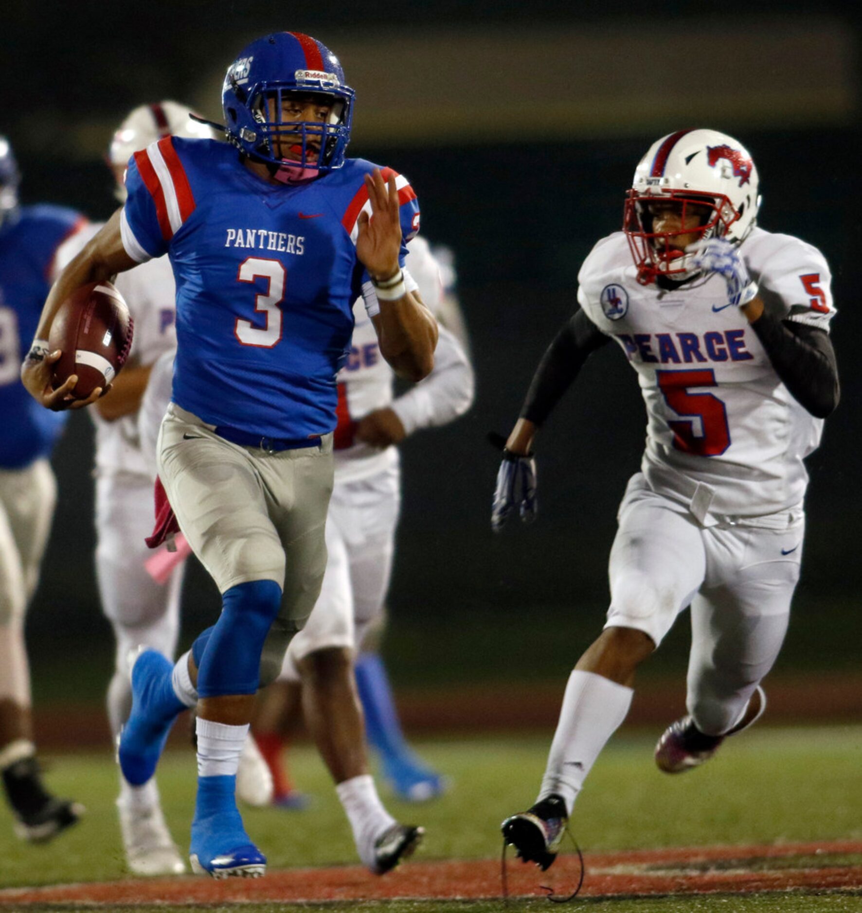 Duncanville quarterback Ja'Quinden Jackson (3) is "off to the races" as he is pursued...