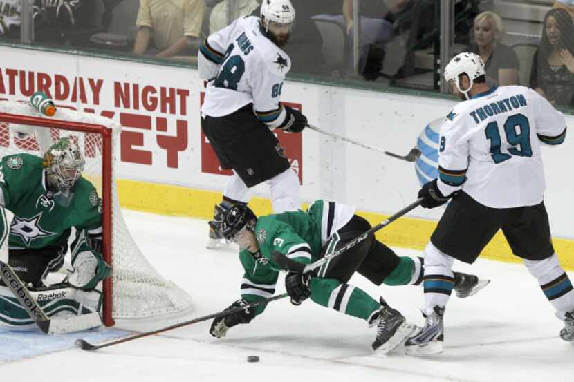 Dallas' Jamie Benn fires home his unassisted goal in the third period during the Vancouver...