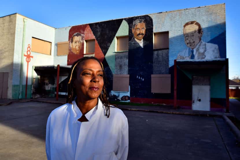 Dr. Michelle Morgan outside an abandoned building she purchased on Martin Luther King Jr....