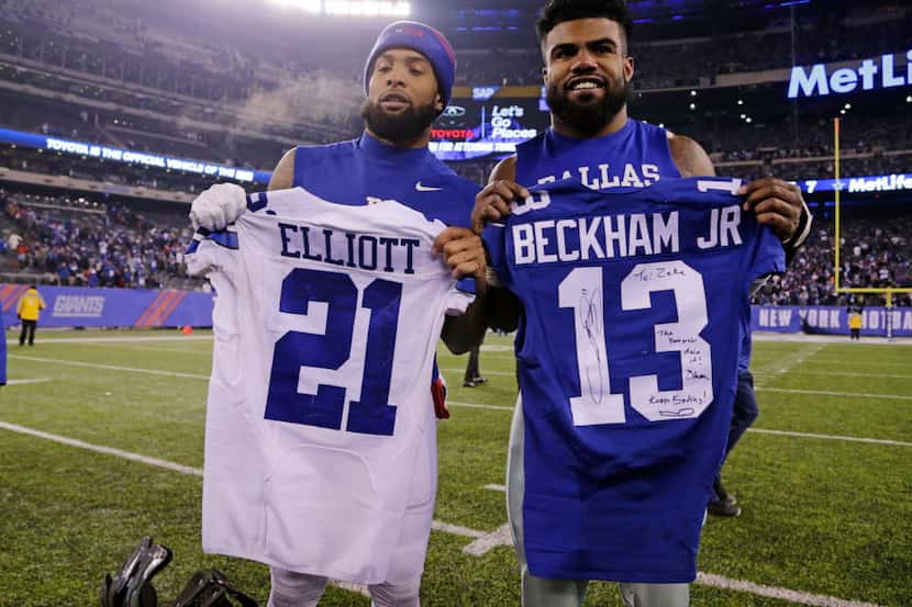 Dallas Cowboys running back Ezekiel Elliott (21) and New York Giants' Odell Beckham (13)...