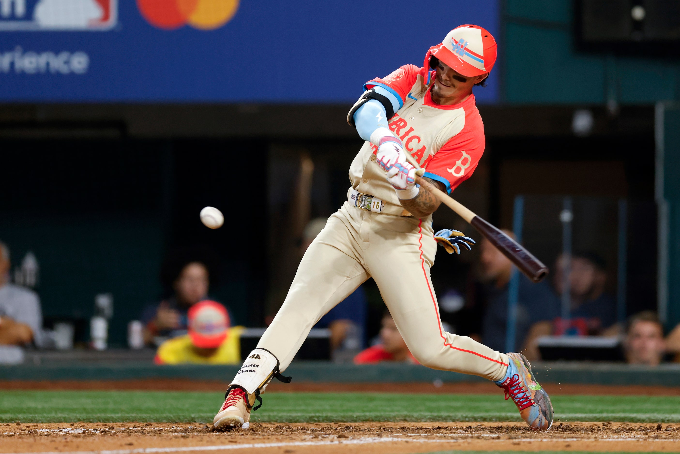 American League's Jarren Duran, of the Boston Red Sox, hits a two-run home run during the...