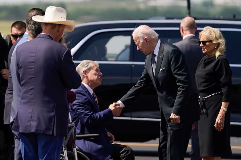 FILE - President Joe Biden and first lady Jill Biden greet Texas Gov. Greg Abbott as they...