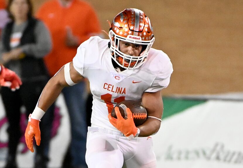 Celina's Gabe Gayton (11) runs upfield in the second half of a Class 4A Division II Region I...