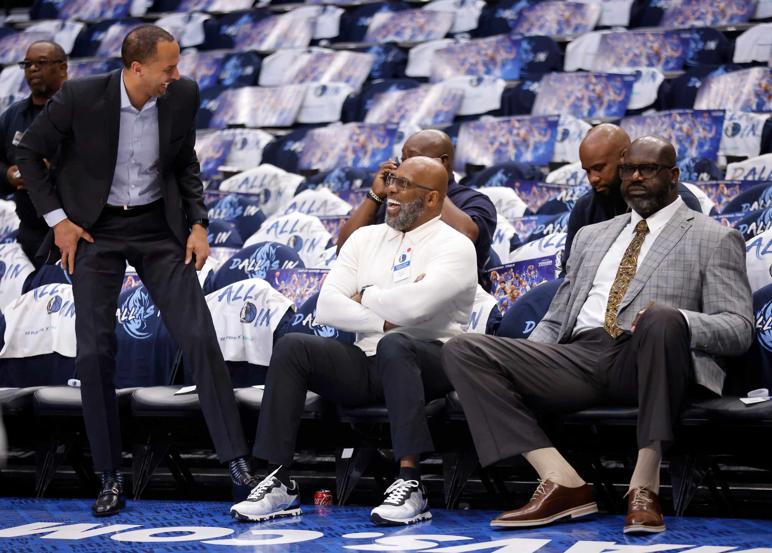 TNT sports broadcaster Shaquille ‘Shaq’ O’Neal (right) and Jerome Crawford (center) visit...