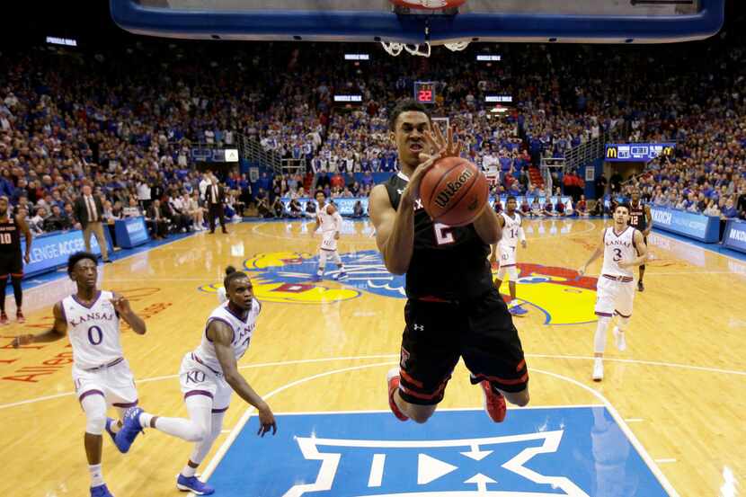 Texas Tech's Zhaire Smith (2) dunks the ball during the second half of an NCAA college...
