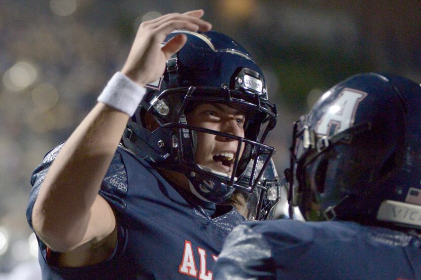 Allen quarterback General Booty celebrates after his touchdown run in the second quarter of...
