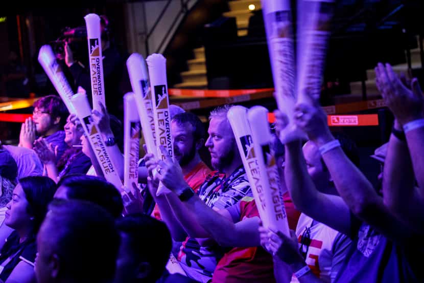 Overwatch fans cheer during the Overwatch League team match between the Dallas Fuel and New...
