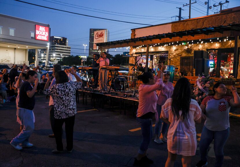 Family members, friends and patrons of Casita Tex-Mex Bar and Grill join together on the...