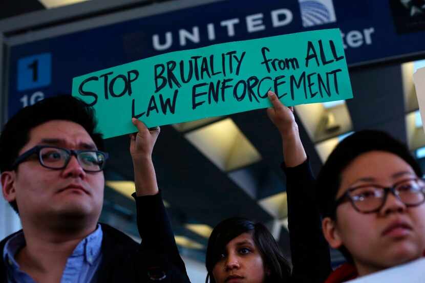 Demonstrators protest United Airlines at O'Hare International Airport on April 11, 2017 in...