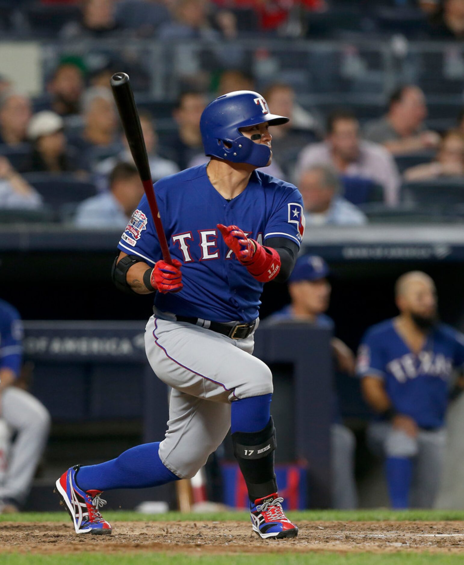 NEW YORK, NEW YORK - SEPTEMBER 04:   Shin-Soo Choo #17 of the Texas Rangers follows through...