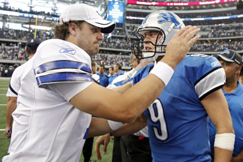 Dallas Cowboys quarterback Stephen McGee (left) congratulates Detroit Lions quarterback...