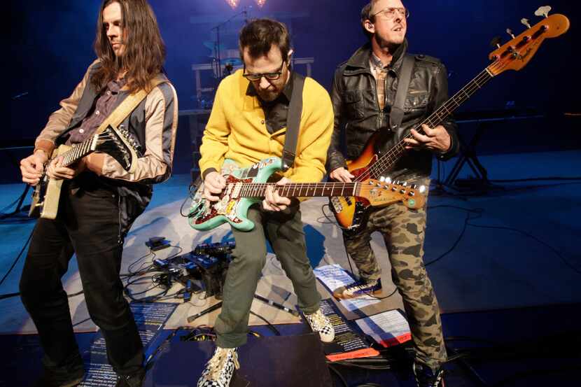 Weezer performs during the "How The EDGE Stole Christmas" show at Verizon Theatre in Grand...