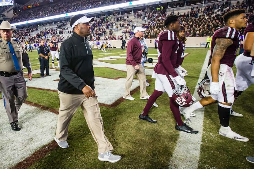 Texas A&M head coach Kevin Sumlin walks off the field after a loss to LSU in an NCAA...