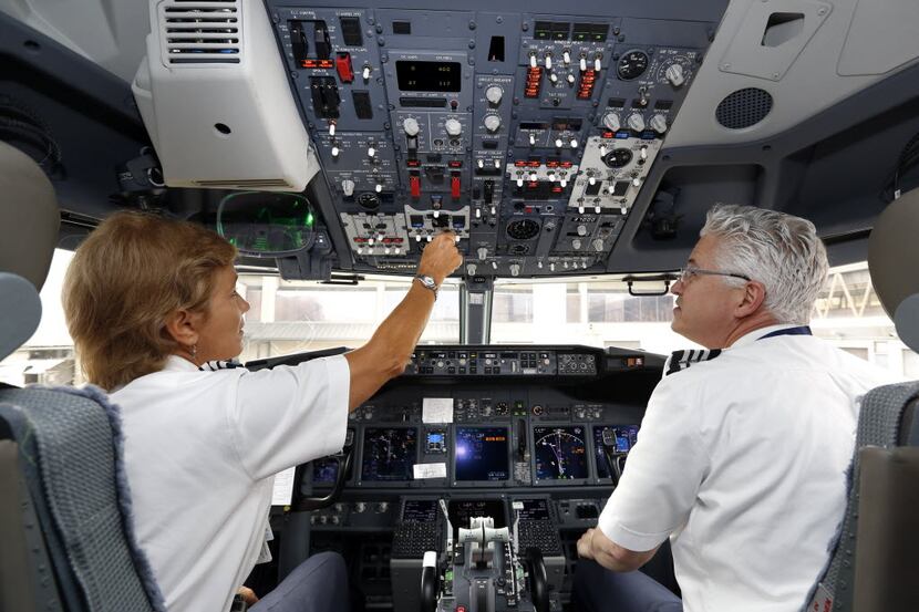 American Airlines Flight Captain Kathi Durst (left) and First Officer Chuck Norris prepared...