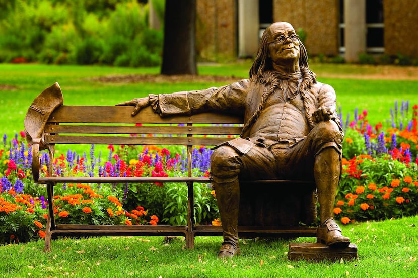 
There are eight bronze life-size sculptures of nine historic men -- including Benjamin...