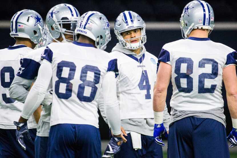 Dallas Cowboys quarterback Dak Prescott (4) calls a play during their practice on Friday,...