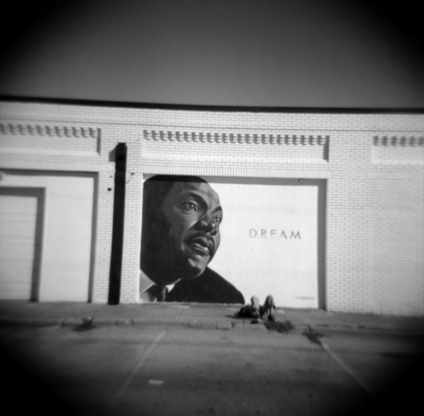 Dream, a mural depicting Martin Luther King Jr., is on the side of a building on Meadow...