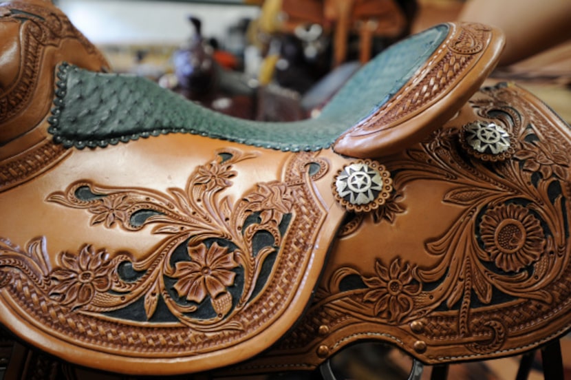 One of leather artist Jerry Shaw's horse saddles in his work space in McKinney, Texas on...