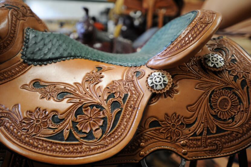 One of leather artist Jerry Shaw's horse saddles in his work space in McKinney, Texas on...