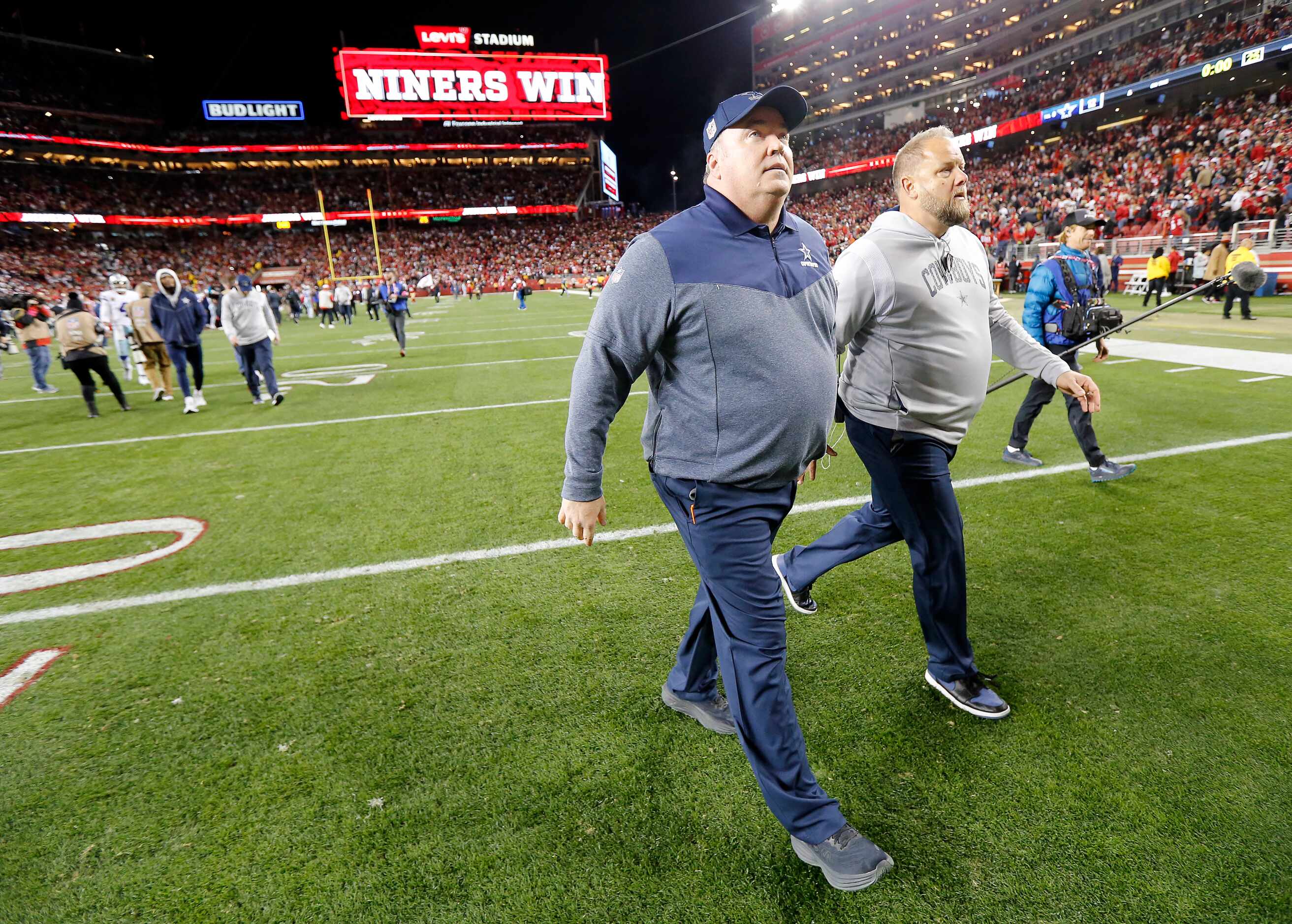 Dallas Cowboys head coach Mike McCarthy walks off the field following their loss to the San...