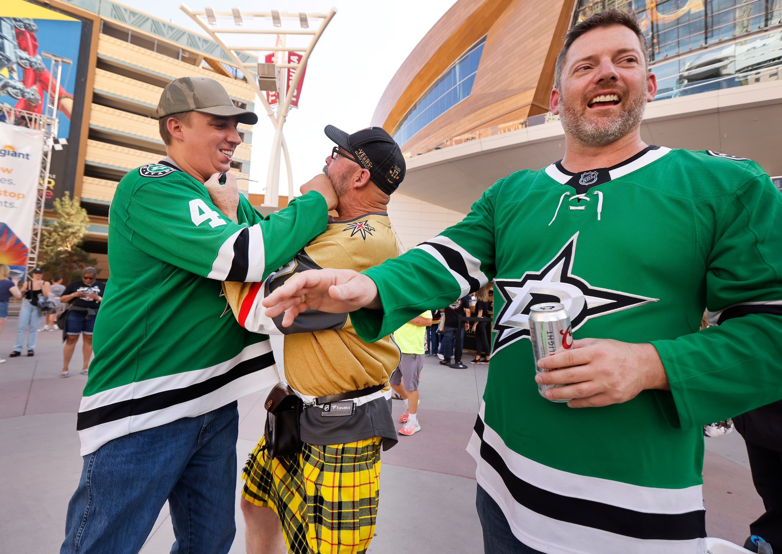 Dallas Stars fans John Boyd (left) and Johnny Kabella of Houston clown around with Vegas...